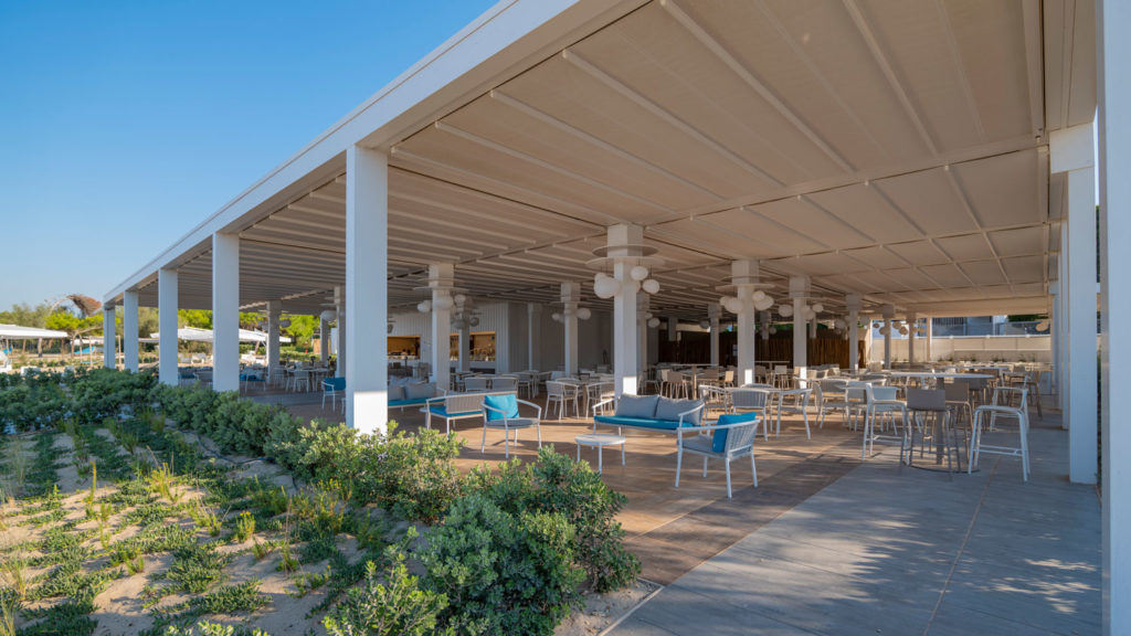 Why Consider Adding Pergolas with Retractable Roofs Outside Business Space